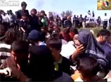 Видео из Сирии: боевики обезглавили католического священника на глазах у таинственных людей, говорящих по-русски