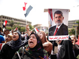 Египетские оппозиционеры и сторонники действующей власти вышли на улицы Каира в канун истечения первого ультиматума президенту Египта Мухаммеду Мурси