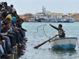 Папа Франциск прибыл на остров иммигрантов
