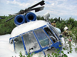По данным следствия, при взлете вертолета возникла вибрация, он получил крен, задел винтами землю и завалился на бок