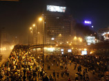 Десятки тысяч сторонников Мурси в ночь на вторник перекрыли транспортные артерии Каира