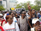 В США афроамериканцы вновь вышли на улицы страны в знак протеста против оправдательного приговора 29-летнему Джорджу Циммерману, застрелившему чернокожего подростка