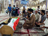 Похороны жертв нападения на печально известную "Абу-Грейб", которое произошло в ночь с воскресенья на понедельник