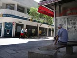 Международные кредиторы разрешили Кипру "состричь" 45% незастрахованных депозитов вместо 60%