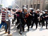 В столице Египта произошли столкновения между противниками Мурси и исламистами - полиция применила газ