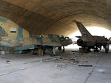 МиГ-21 армии Сирии на разгромленном повстанцами аэродроме Даба