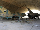 МиГ-21 армии Сирии на разгромленном повстанцами аэродроме Даба МиГ-21 армии Сирии на разгромленном повстанцами аэродроме Даба