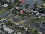 В затопленном Комсомольске-на-Амуре уже более 5 тыс. пострадавших, а в Хабаровске и Приамурье вода отступает В затопленном Комсомольске-на-Амуре уже более 5 тыс. пострадавших, а в Хабаровске и Приамурье вода отступает