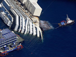 В Италии все готово для подъема Costa Concordia - после полутора лет подготовки полузатонувший лайнер ставят на киль В Италии все готово для подъема Costa Concordia - после полутора лет подготовки полузатонувший лайнер ставят на киль