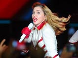 55-летнюю Мадонну в третий раз выдают замуж - за 25-летнего танцора. Но сама она не спешит, хотя и счастлива с Брахимом 55-летнюю Мадонну в третий раз выдают замуж - за 25-летнего танцора. Но сама она не спешит, хотя и счастлива с Брахимом
