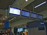 Представитель авиакомпании "Трансаэро" заявил, что регистрация на рейсы и прием багажа не идет из-за того, что вышла из строя транспортная лента. Авиакомпания к этому не причастна