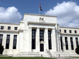 ФРС США продолжила "смягчение" и оставила  базовую ставку на рекордно низком уровне