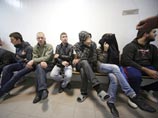 Задержанные во время беспорядков в Бирюлево в здании Чертановского суда в Москве, 14 октября 2013 года