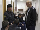 Задержанные во время беспорядков в Бирюлево в зале судебных заседаний в здании Чертановского суда, 14 октября 2013 года