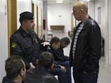 Задержанные во время беспорядков в Бирюлево в зале судебных заседаний в здании Чертановского суда, 14 октября 2013 года Задержанные во время беспорядков в Бирюлево в зале судебных заседаний в здании Чертановского суда, 14 октября 2013 года