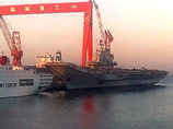 Известно, что американский боевой корабль двигался неподалеку от китайского авианосца Liaoning ("Ляолин")