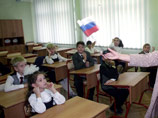 Президент России Владимир Путин подписал закон, расширяющий области использования государственных символов - флага и гимна