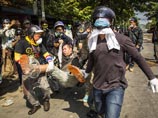 Неизвестные расстреляли демонстрантов в столице Таиланда, есть жертвы
