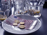 Большинство жителей Латвии уже расплачиваются в евро