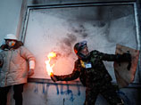 Украинский премьер Азаров пригрозил применить силу, если столкновения в Киеве
не прекратятся