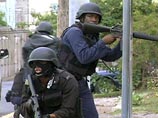 СМИ: На Ямайке полицейские "эскадроны смерти" ежедневно совершают убийства СМИ: На Ямайке полицейские "эскадроны смерти" ежедневно совершают убийства