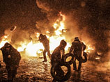 В Киеве возобновились столкновения демонстрантов с силовиками. Убит милиционер