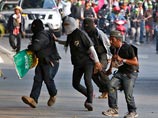 Беспорядки накануне выборов в Таиланде: среди семерых раненых есть журналисты
