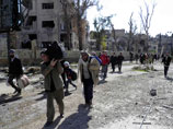 Власти и оппозиция Сирии обвиняют друг друга в нарушении перемирия в
Хомсе, куда прибыла гуманитарная помощь