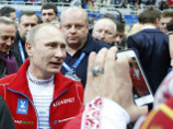 Путин побывал в Доме российского болельщика и поздравил российских фигуристов