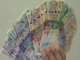 Аналитиков поразил размах девальвации казахстанской валюты Аналитиков поразил размах девальвации казахстанской валюты