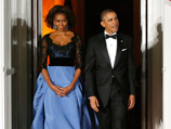 Во время мероприятия внимание прессы привлекло роскошное платье его супруги Мишель Обамы - эксперты оценили его стоимость в 10-12 тысяч долларов