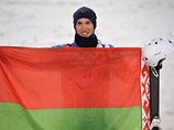 Антон Кушнир (Белоруссия), завоевавший золотую медаль в лыжной акробатикие во время соревнований по фристайлу среди мужчин на XXII зимних Олимпийских играх в Сочи, во время цветочной церемонии