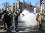 Беспорядки в Киеве обернулись жертвами и поджогами Беспорядки в Киеве обернулись жертвами и поджогами