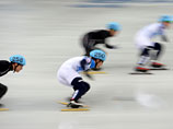 Виктор Ан (Россия) в эстафете на 5000 метров на соревнованиях по шорт-треку среди мужчин на XXII зимних Олимпийских играх в Сочи