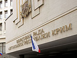 Неизвестные заняли здания правительства и парламента Крыма Неизвестные заняли здания правительства и парламента Крыма