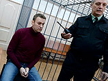 Навального доставили в Басманный суд из следственного изолятора, где он с 25 февраля отбывает недельный административный арест за участие в несанкционированной акции в поддержку осужденных фигурантов "болотного" дела