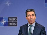 Генсек НАТО Андерс Фог Расмуссен заявил в воскресенье, что Россия угрожает миру в Европе, осуществляя свои военные действия на Украине, и должна срочно осуществить "деэскалацию напряжения"