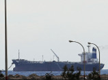 Ливийские боевики призывают не бомбить танкер КНДР, в который они заливают нефть