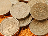 Великобритания выпустит новую монету в 1 фунт из-за большого количества подделок