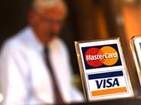 Международные платежные системы Visa и MasterCard прекратили обслуживать карты некоторых банков в соответствии с решением Минфина США