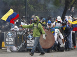 В Венесуэле политики пытаются остановить гибель людей: президент Николас Мадуро и лидеры оппозиции проводят переговоры на фоне многодневных кровопролитных протестов в стране