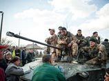 Киев отказывается выводить войска из восточных областей и требует от "бандформирований" немедленно разоружиться