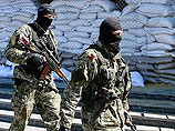В Краматорске вооруженные люди заняли отделение милиции и вывесили флаг Донецкой республики на воротах СБУ