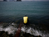 Число жертв крушения южнокорейского парома "Севол" в Желтом море по данным на утро пятницы возросло до 181 человека