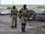 Ополченцы сил самообороны в Славянске Донецкой области, как и собирались, освободили двоих из троих бойцов подразделения "Альфа" СБУ Украины в обмен на своих сторонников
