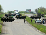 Украинские силовики в продолжение антитеррористической операции вошли в Славянск и отбили телевышку у сепаратистов