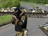 Периодически стрельба продолжается у Славянска на севере Донецкой области, военные и техника замечены в четырех районах Луганской области