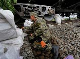 Донецкие ополченцы требуют вывода украинских войск и обещают ответить на санкции ЕС. Киев грозит ужесточением АТО Донецкие ополченцы требуют вывода украинских войск и обещают ответить на санкции ЕС. Киев грозит ужесточением АТО