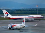 Malaysia Airlines, чей самолет два месяца ищут в Индийском океане, отчиталась о рекордных убытках