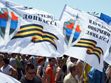 Участники митинга в поддержку Донецкой Народной Республики (ДНР) на площади Ленина в Донецке